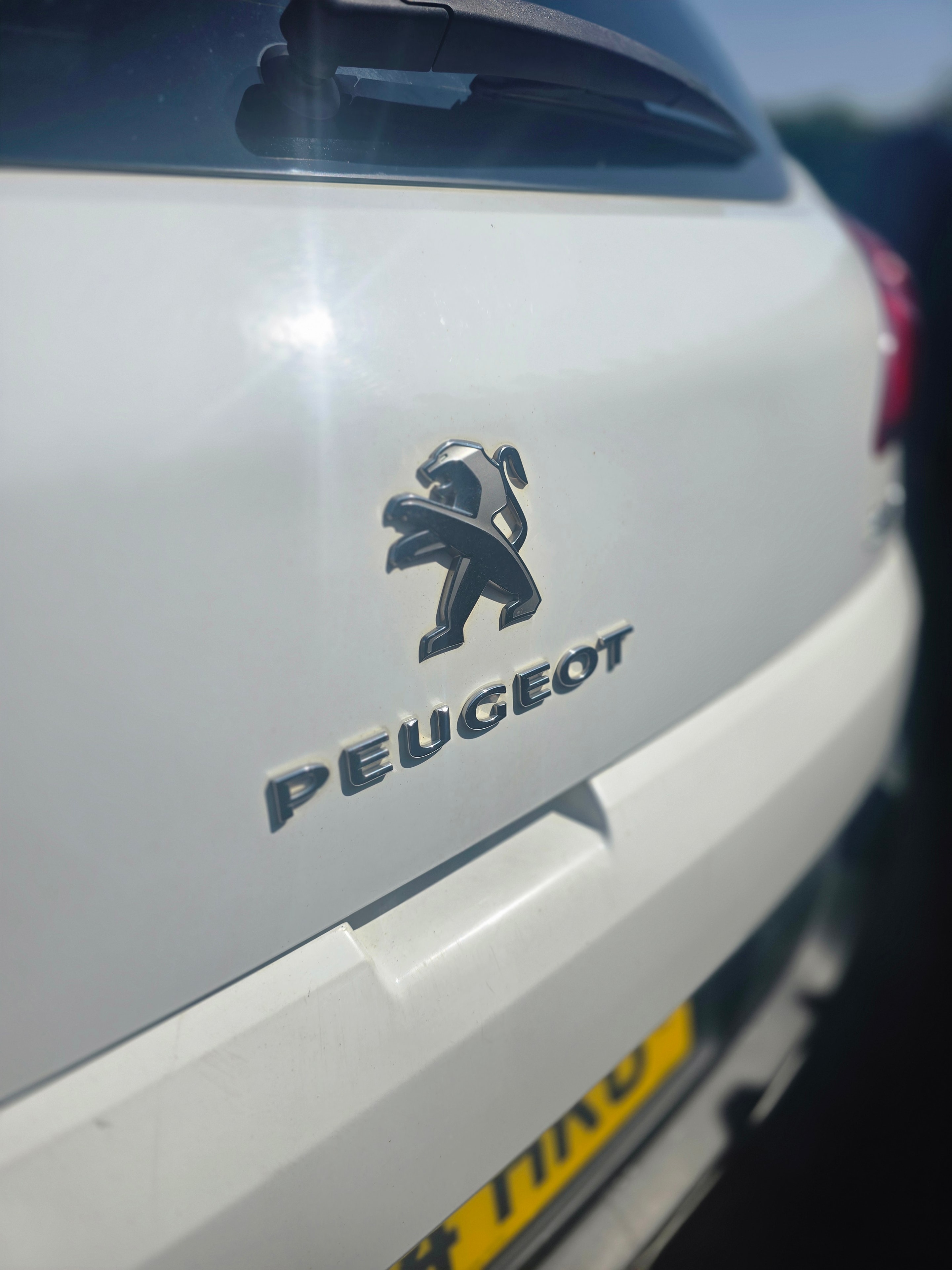Peugeot badge on boot lid